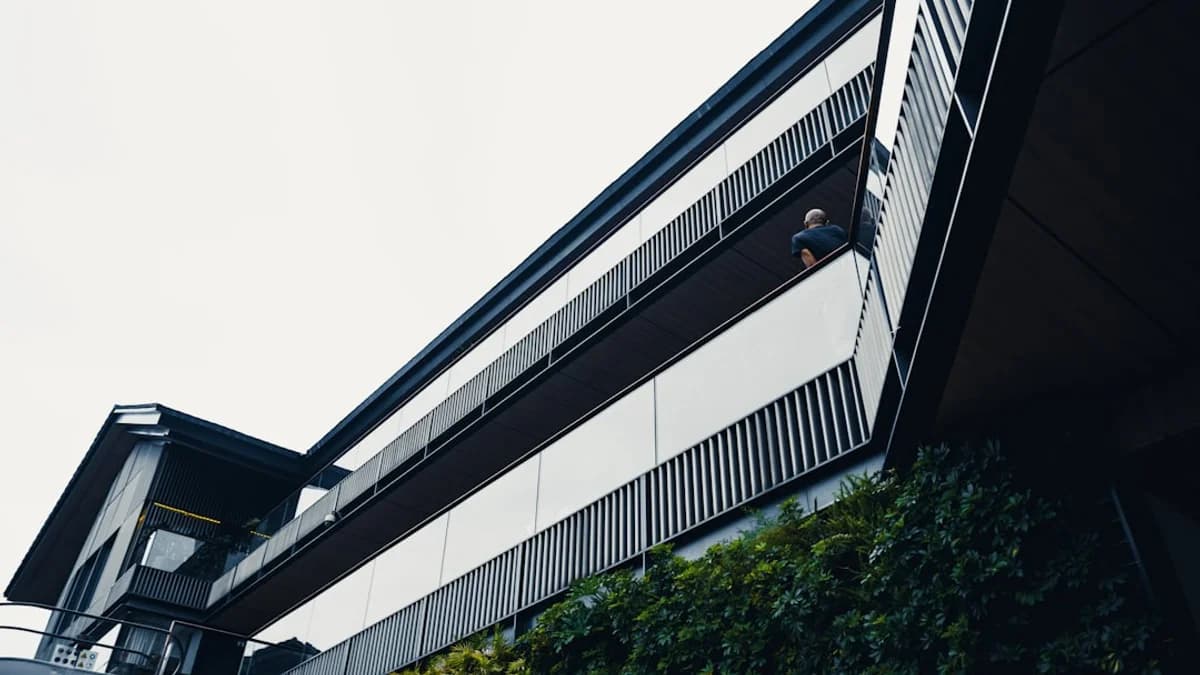 Facilities manager walking a commercial property with a printed fire inspection checklist