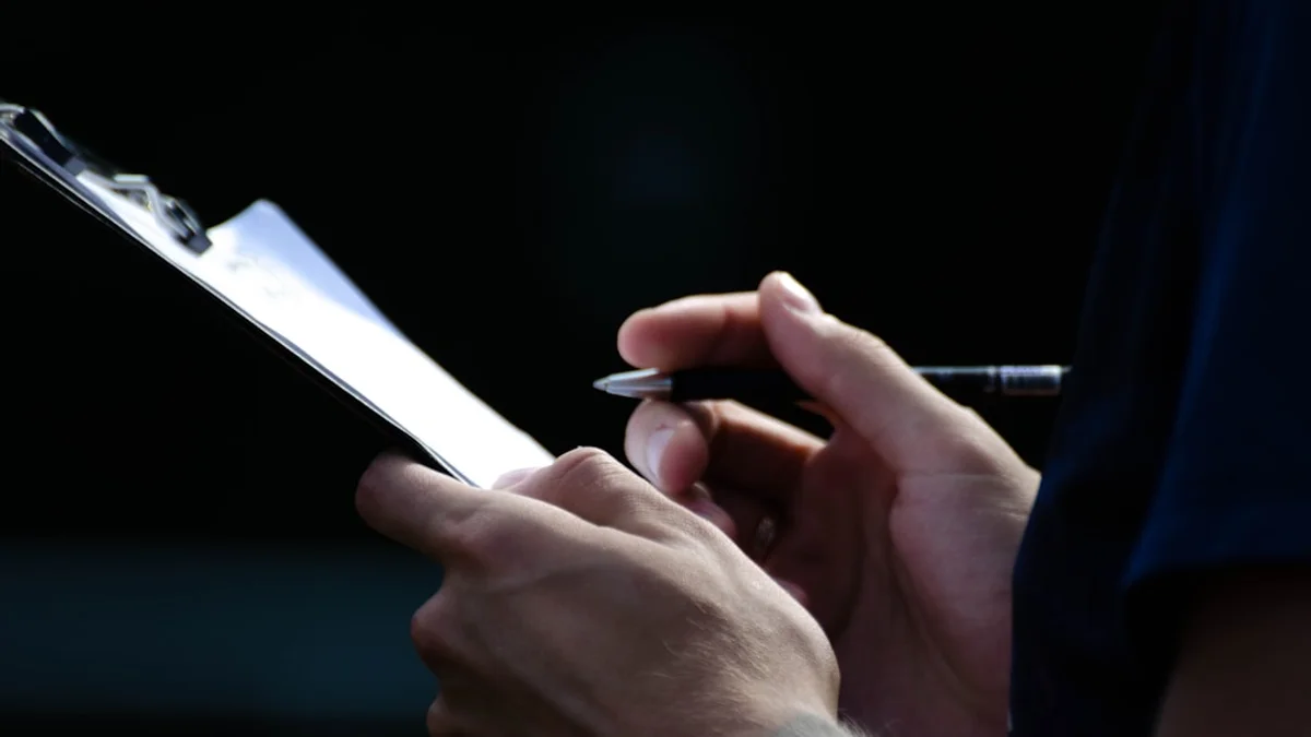 Clipboard with fire inspection checklist on a commercial property walkthrough